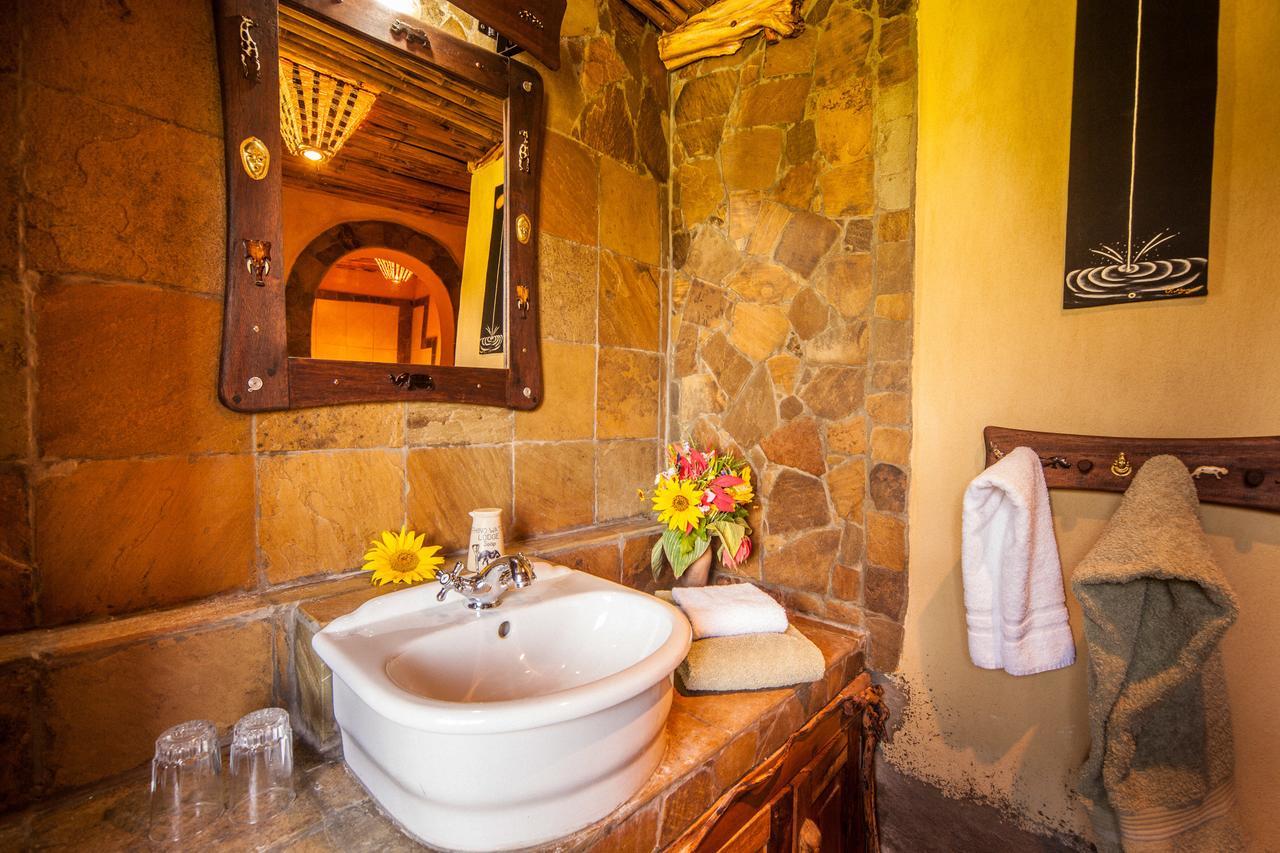 Rhino Watch Safarilodge Mweiga Quarto foto